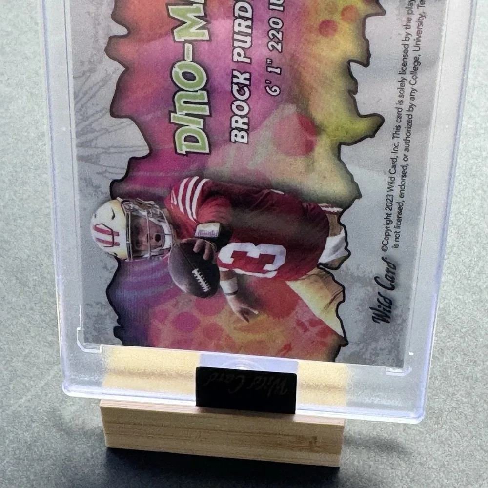 Brock Purdy Dino-Might Illumination‎ Wild Card Football QB Insert Parallel